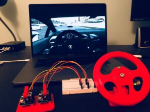 How do I connect my steering wheel to my Xbox 360?